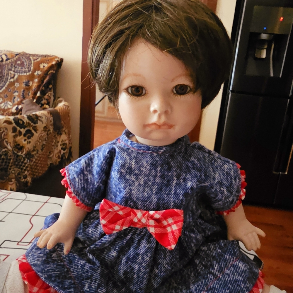 Vintage Porcelain Doll 1992 year. Short hair and beautiful dress